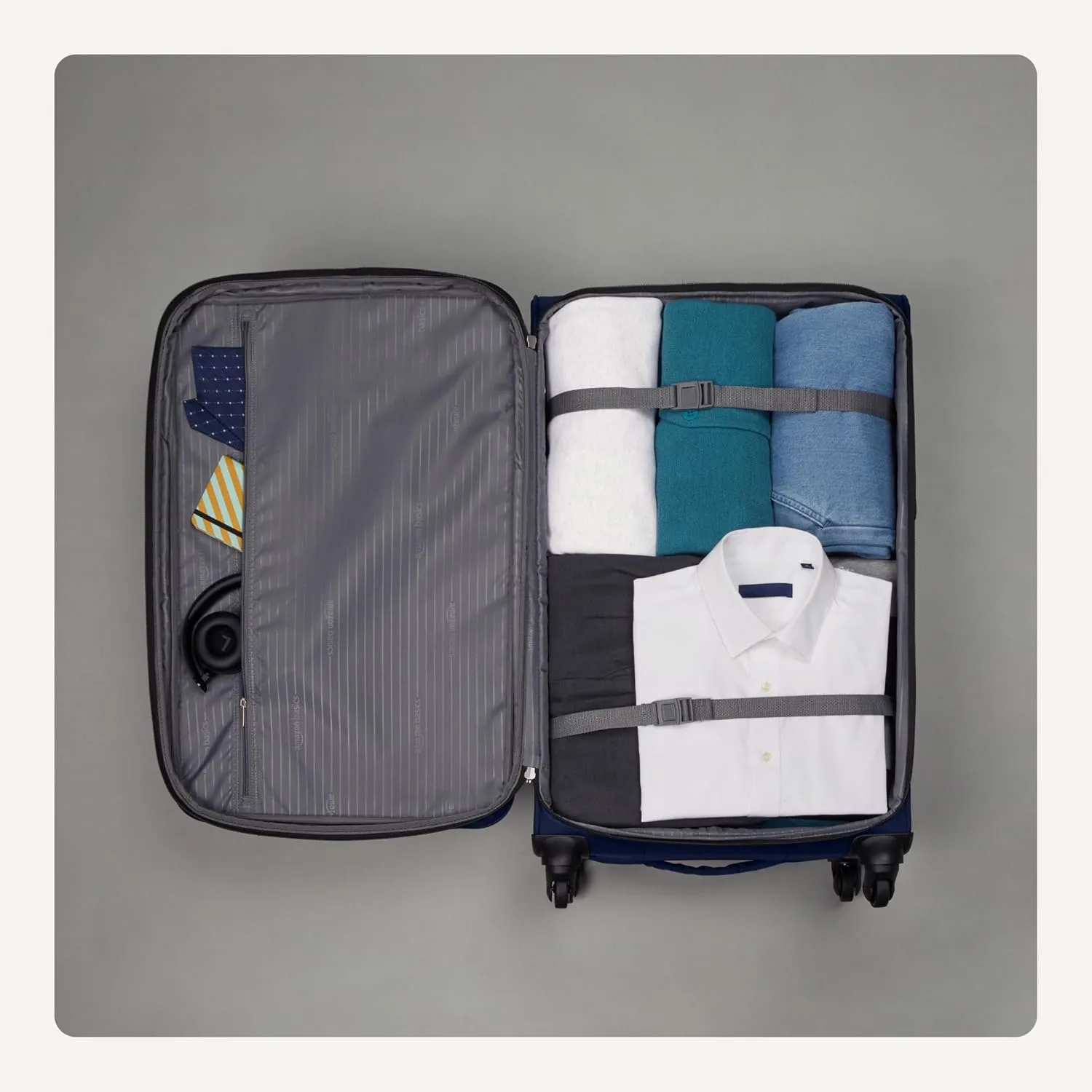 Amazon Basics Luggage, 30" Large Checked Softside Suitcase With Wheels, With Four 360-Degree Multi-directional Spinner Wheels, Expandable Capacity, Zippered Pocket and Straps, Telescopic Handle, Black