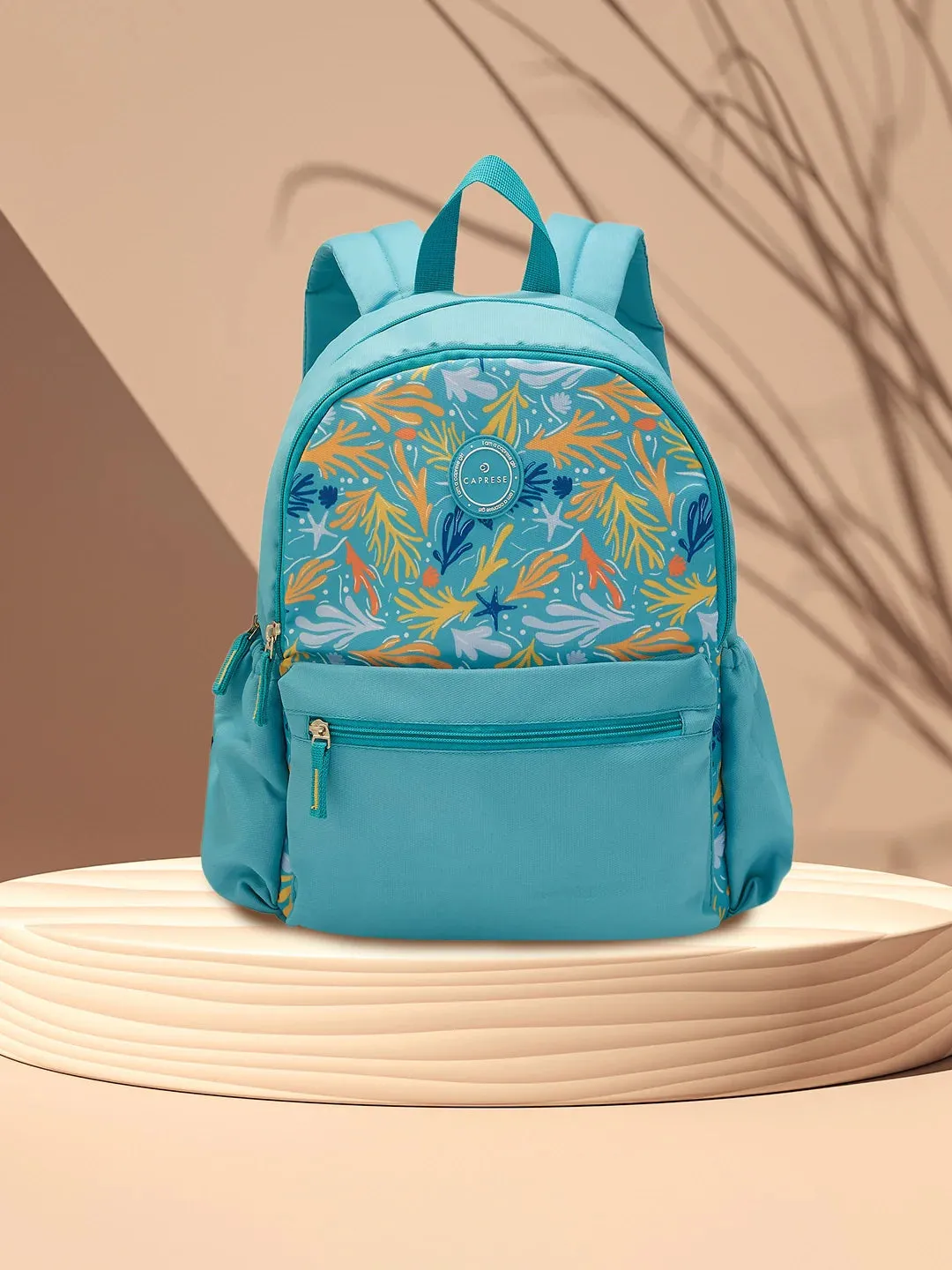 Caprese Xenia Medium Turquoise Printed Backpack